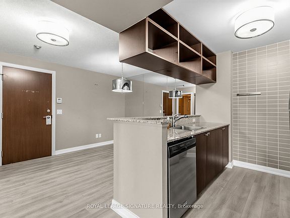 2nd image of 151 Village Green Sq #607