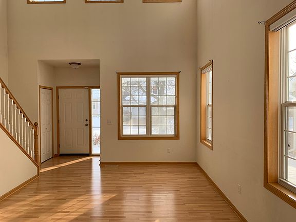 Inviting Entry into a 2 story living room