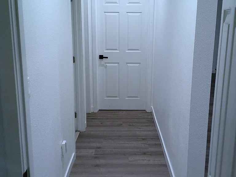 Hallway 1, facing Bedroom 1.