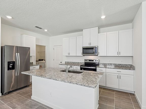 The Kitchen at 7355 Queensgate Circle.