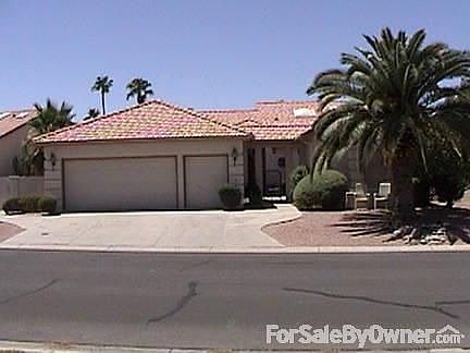Front or Northside of home.
						:
						Two car garage with golf cart door.