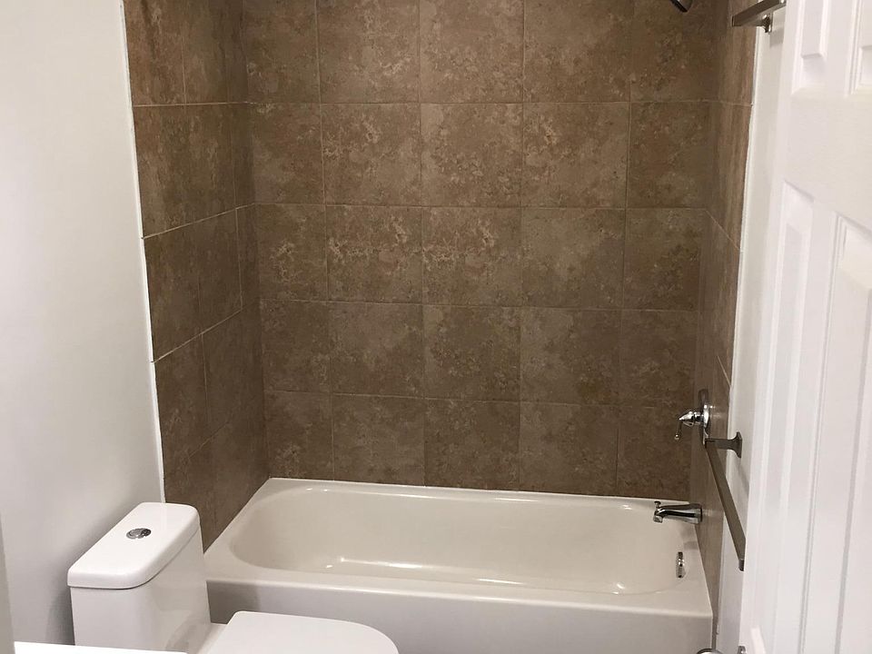 Renovated Bathroom - New Tub/Shower, New Tile, New Toilet an