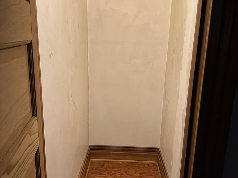 This is a photo of the storage area where I hope to convert to a half bath on the main level. - Photo taken 4-12-24