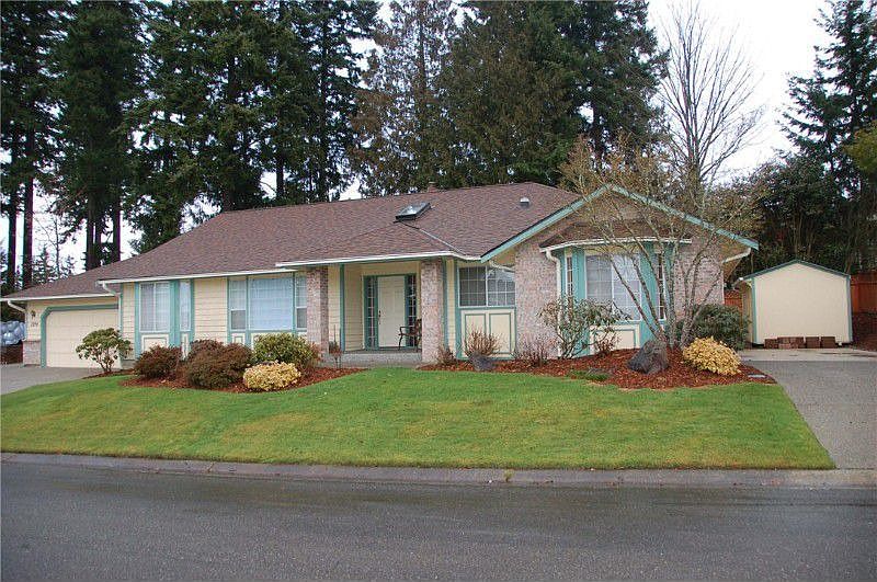 Located in a quiet cul de sac with an small grassy area to the right of the home that is owned by th