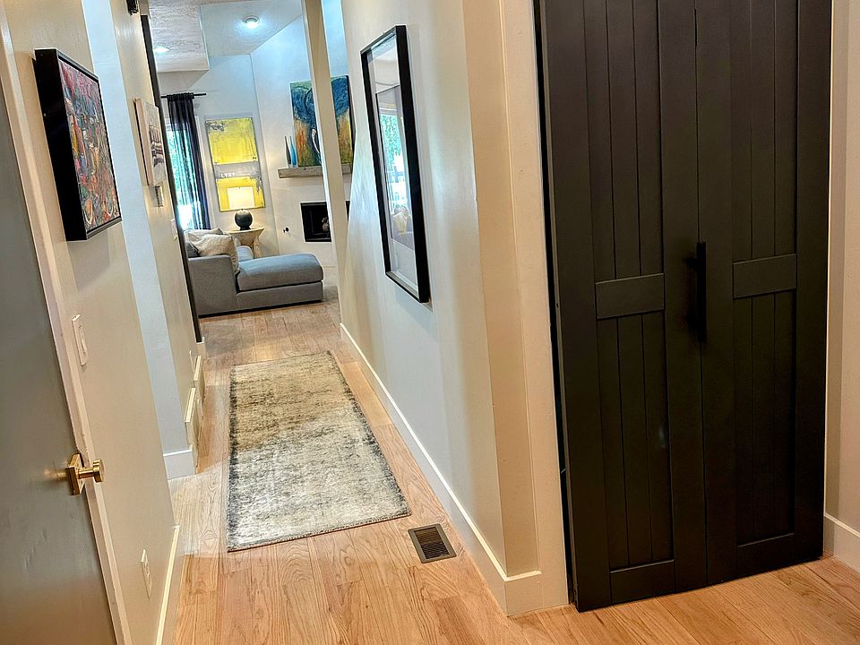 Entry -- there is a hall to the left that goes to the power bath, the laundry and a large hall closet perfect to store winter gear.