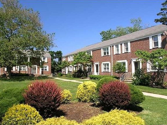 Exterior landscaped in front of condos