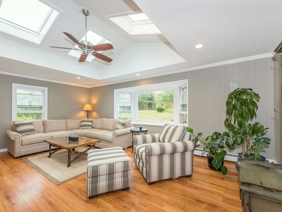 Great Room with 4 Skylights!