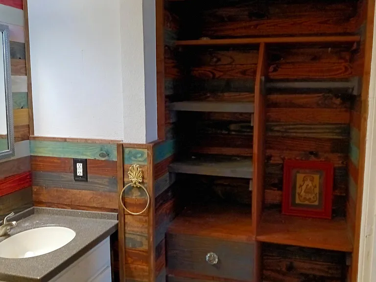 Built ins in bath for extra storage and a place for make up. (Will fit a vanity chair) Look at the drawers available!