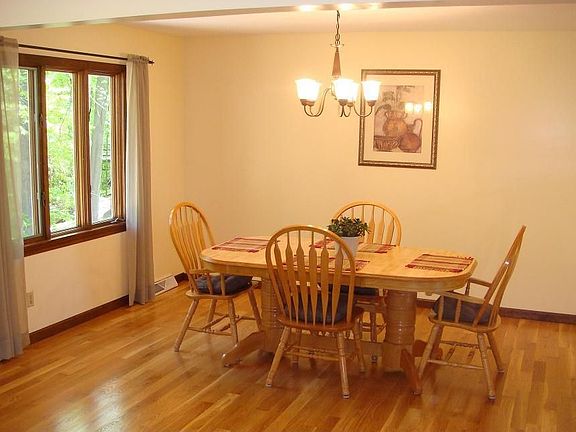 Formal Dining w/ New Hardwood Floors & Bright Sunrise