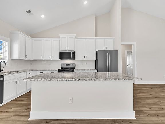 The kitchen has granite countertops.