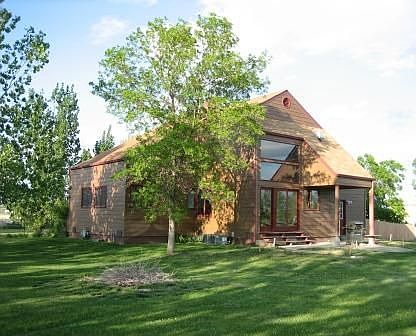 Back of the house with the firepit