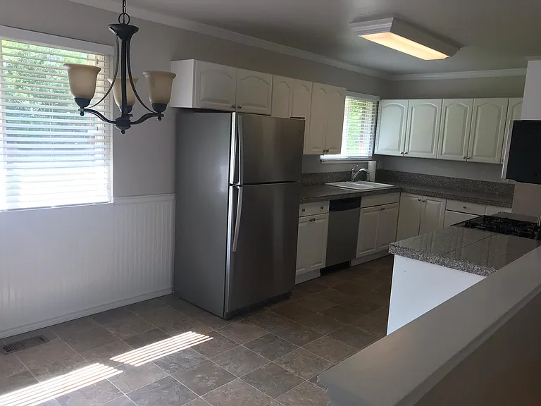 Kitchen with window facing yard/mtn views