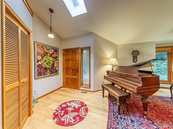 Enter into the living room, floors are engineered maple.