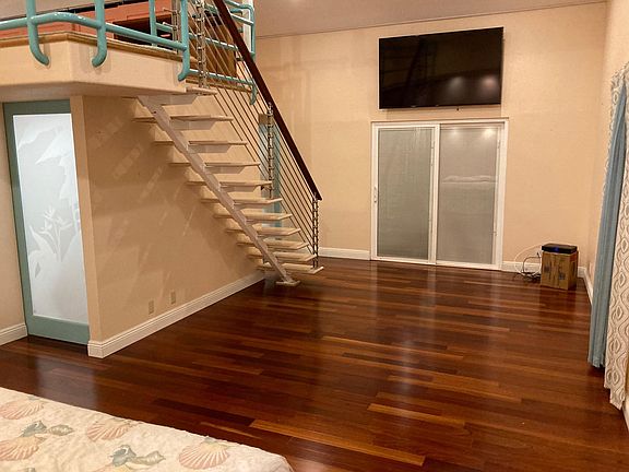 Relax in your private bedroom suite, 70" TV included