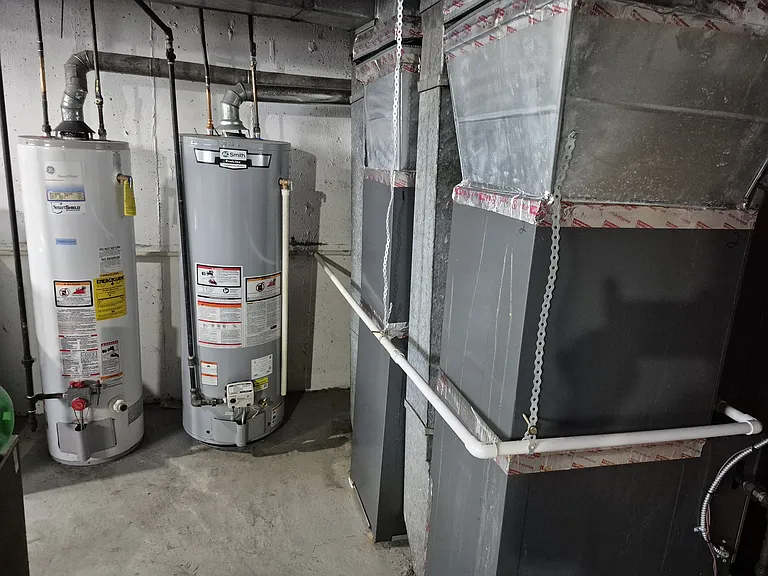 Gas-fired furnaces and hot water tanks