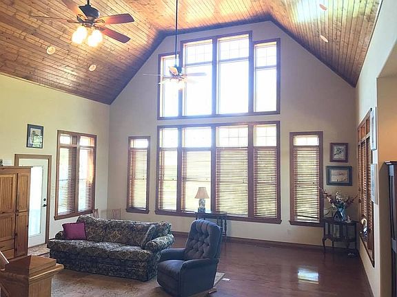 Large windows overlook pond