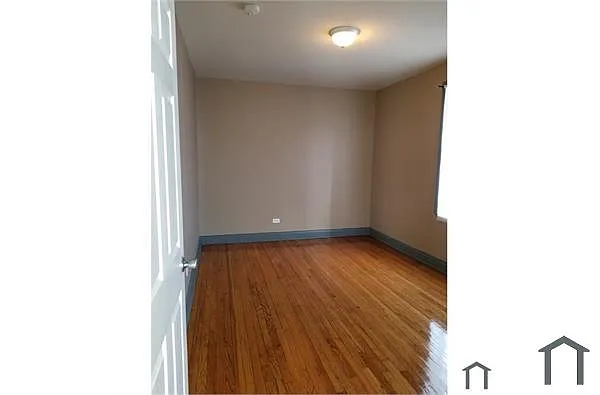 Building Photo - 4914 W 18th St #7