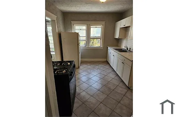 Building Photo - 3270 Desota Ave #UP