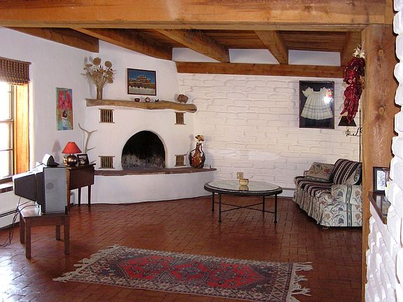 Exposed Beams, Kiva Fireplace in Living Area