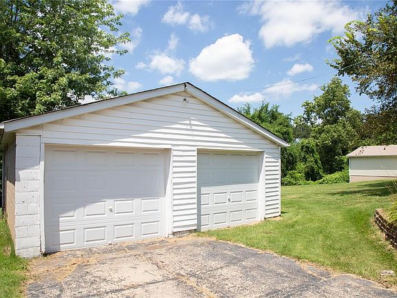 2-car detached garage with garage door openers on both doors. The garage roof was also installed in 2011.