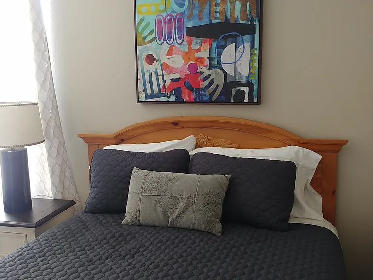 Bedroom number 2 has queen bed
