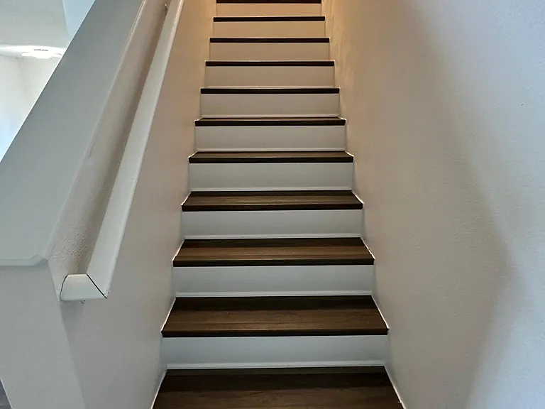 Decorative luxury Plank stairs with white trim