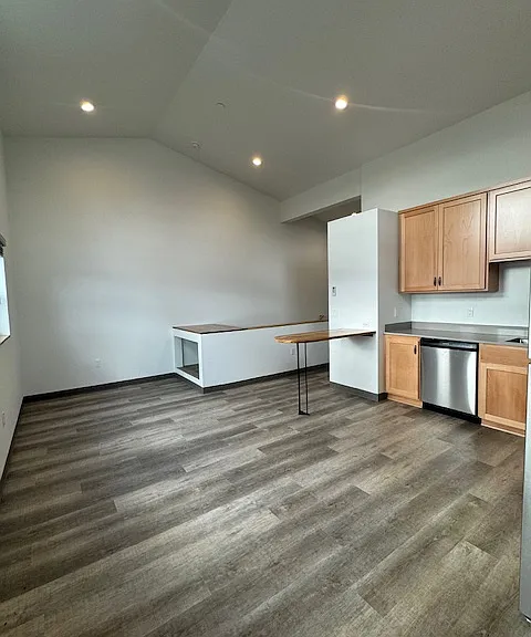 from corner of kitchen looking across living area & kitchen