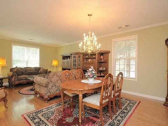 Open formal living and dining space leads to an open kitchen... There is ample room to move about easily while enjoying the company of work associates, friends and family!
