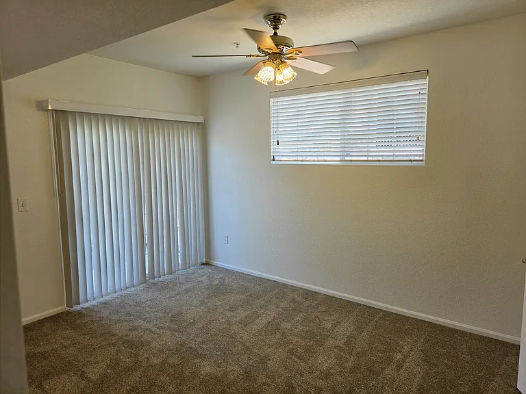 View of primary bedroom from the primary bathroom