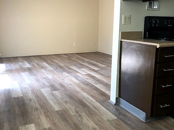 Separate dining area off the kitchen leads into living room