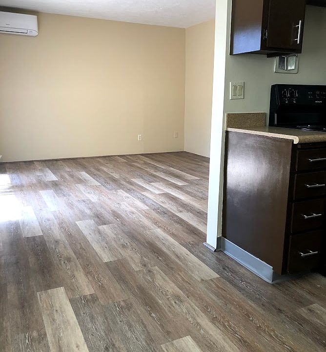 Separate dining area off the kitchen leads into living room