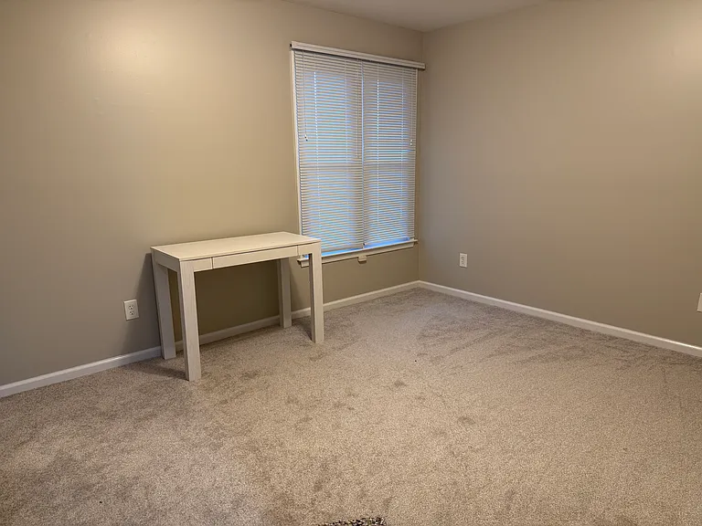 Guest room 11' x 13'11" with large walk in closet. Walls are a soft gray but didn't pick up well in the picture.