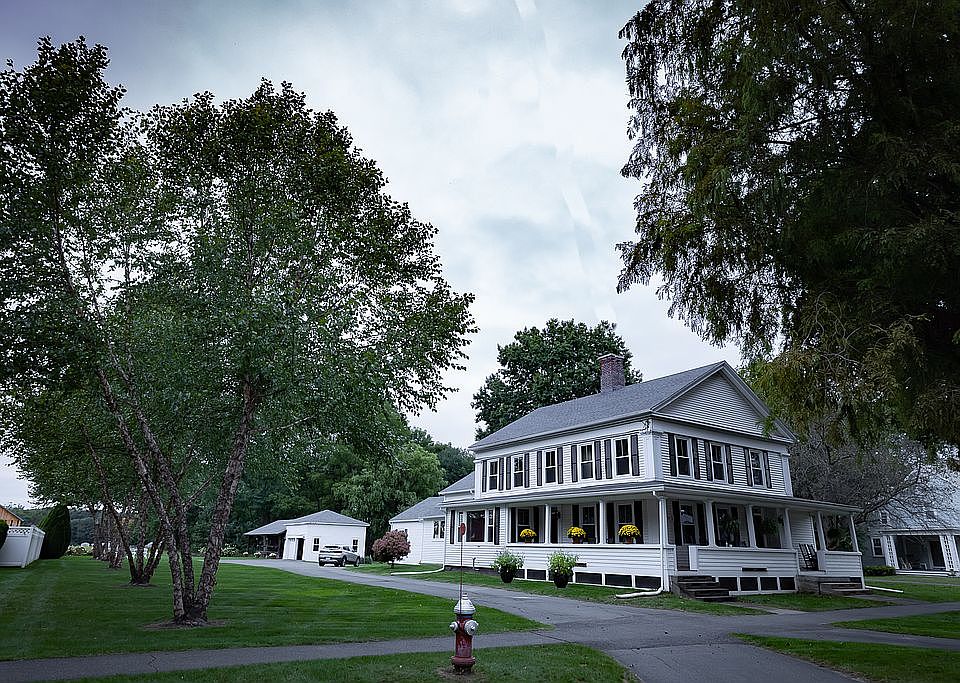 House, garage, and stables. 