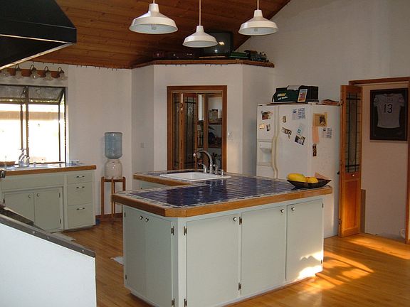 Kitchen, Pantry, and the downstairs Study/Den area.
