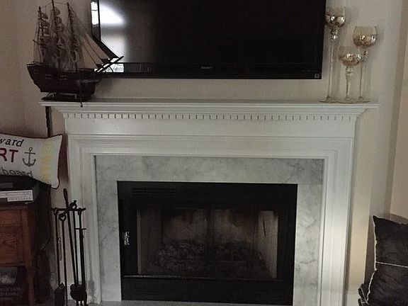 Woodburning fireplace in LR