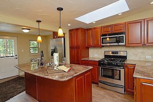 Granite, stainless steel, cherry cainets...wow!