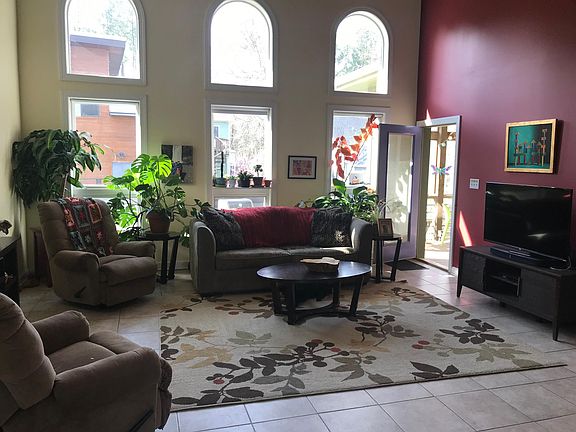 Family room/great room with door onto screened porch