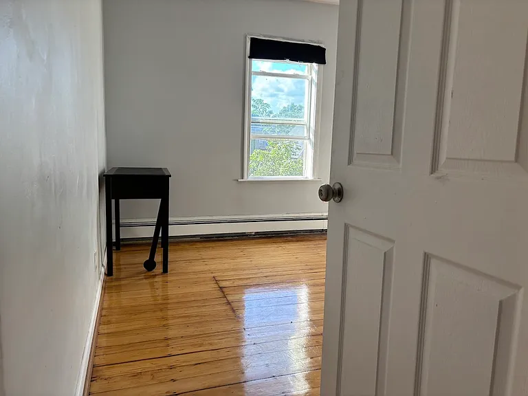 third bedroom as seen from hallway near kitchen