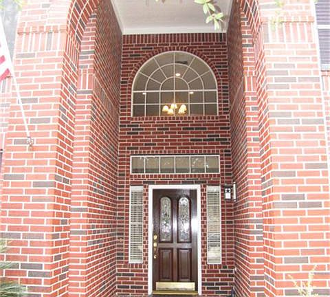 Impressive Covered Front Porch Welcomes You To This Executive Home