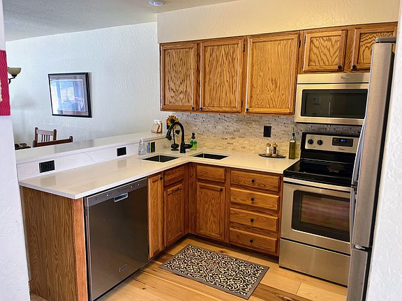 Newer appliances with new quartz counters and fixtures.
