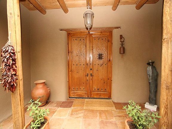 The home is a wonderful value in the luxurious golf community of Las Campanas.