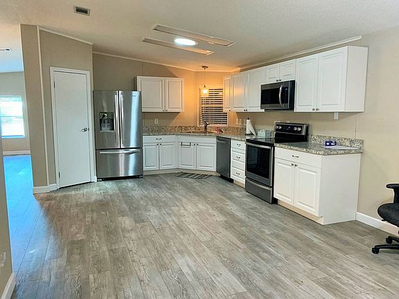 5th image of 1 Plantation Oaks Blvd #135