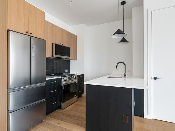 5th image of 11-14 35th Ave #903