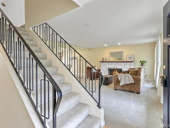 Upon entering the home, you have open site lines to the light and bright living & dining rooms. To the left is the main level be