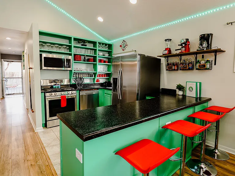 A kitchen showcasing a clean counter, providing a pristine and inviting workspace for cooking and preparation