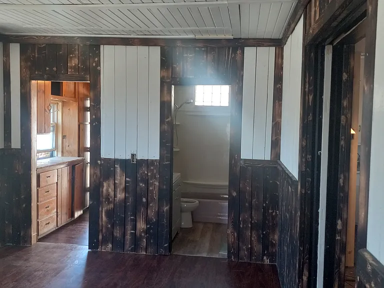 center room to back entrance and bath