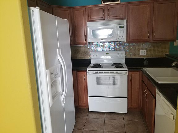 Kitchen includes refrigerator