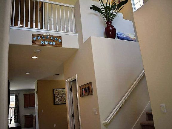 Stairs to bedrooms, laundry