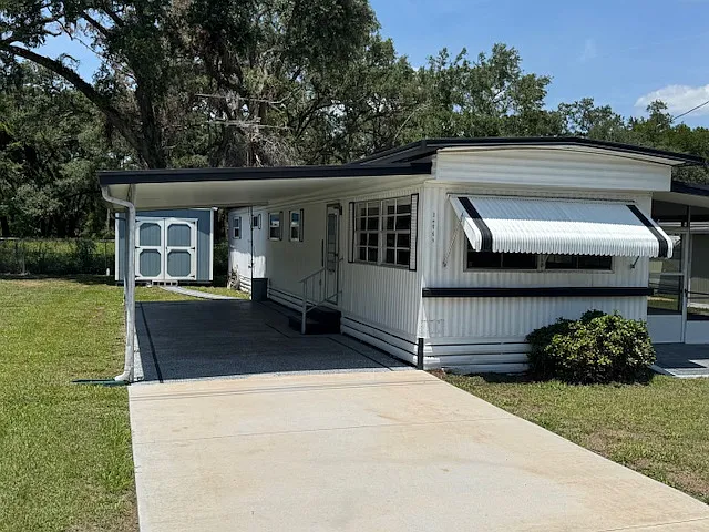 Covered Carport fits 2 cars
