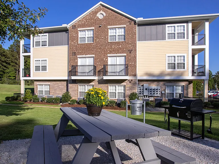 Revel in a cookout at our designated picnic area, complete with a charcoal grill steps from your apartment homean immersive blend of community enjoyment and outdoor dining bliss.